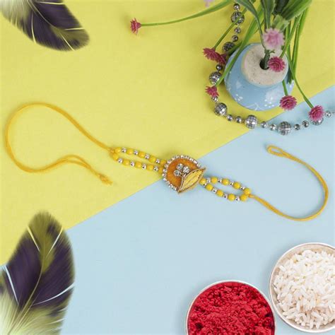 Send Yellow Zardosi Diamond Rakhi Online - RKH22-107385 | Giftalove