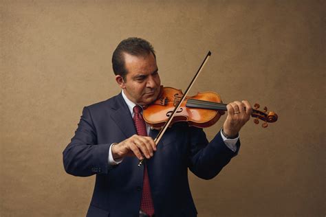A OKC Immigration Lawyer & Violin Aficionado - 405 Magazine