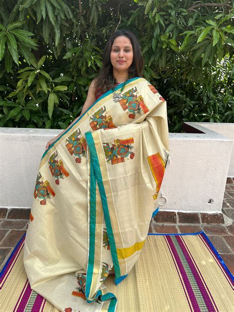 Kerala Tissue Saree with Krishna Ural Motifs and Blue Piping in Border ...