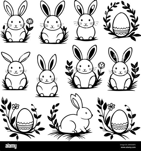 A set black and white rabbits sitting on grass with flowers and an egg ...