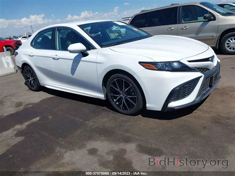 Report 4T1G31AK4NU589948 TOYOTA CAMRY 2022 White Hybrid - price and damage history