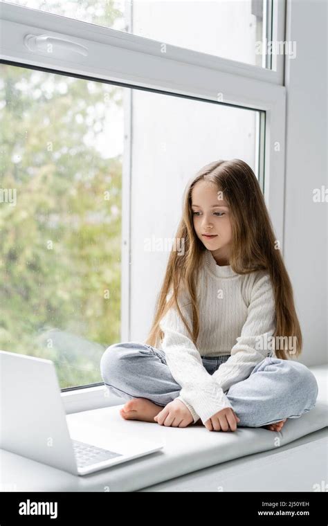 Barefoot Child Using Computer 的图像结果