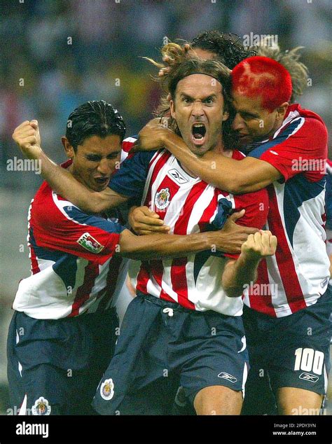 Chivas players Alberto Medina, left, and Adolfo Bautista, right ...