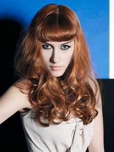 Hairstyle Of by 50s Style For Hair With The Fringe Styled Inward In A Hairstyle Of