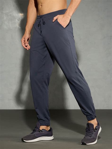 Men Solid Slim Fit Joggers with ELASTOPLUS