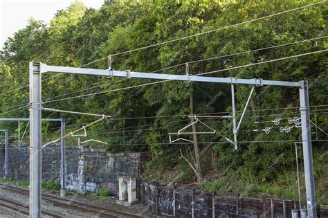 Premium Photo | Railroad tracks and a train represent journey ...