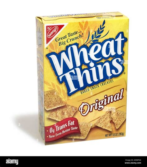 Box of Wheat Thins crackers photographed on a white background Stock ...