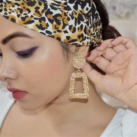 Crumbled Roses Metallic Gold Party Earrings by Joker & Witch