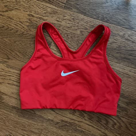Nike red sports bra Size medium, worn couple times... - Depop