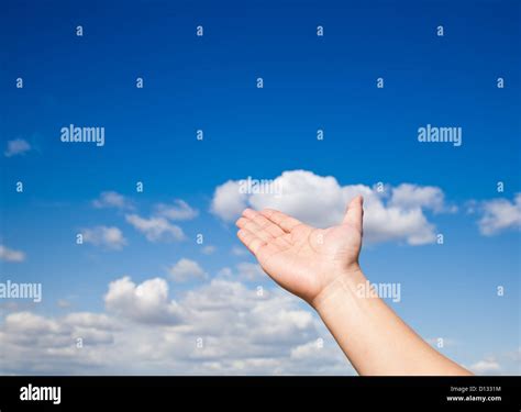 Hand reaching to sky hi-res stock photography and images - Alamy