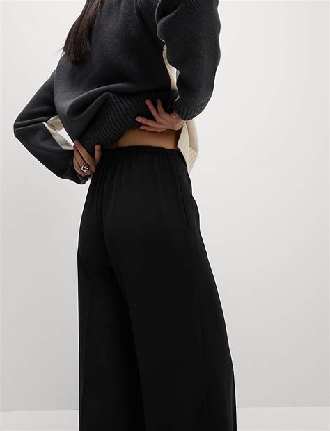 Buy Crepe Elasticated Waist Wide Leg Trousers at Marks & Spencer