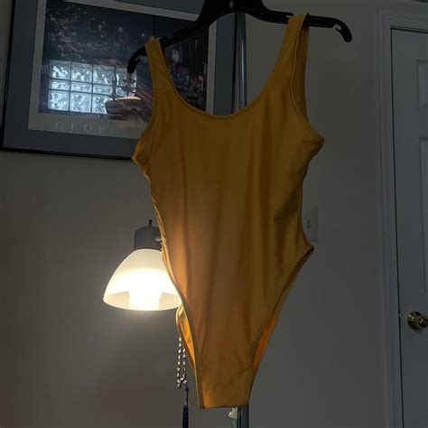 Yellow one piece bathing suit- size Medium #zaful... - Depop