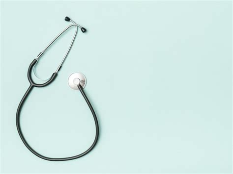 Premium Photo | Stethoscope on blue background, top view and space for text