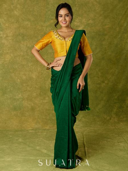 Beautifully hand embroidered light yellow cotton silk blouse for festi ...