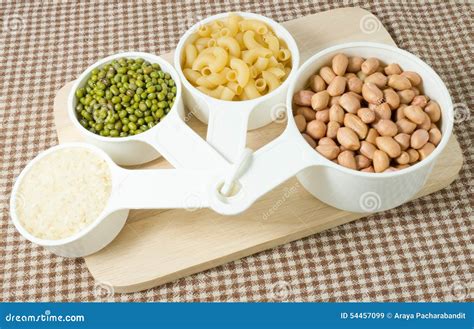 Pasta, Rice, Peanuts and Mung Beans in Measuring Cups Stock Image ...