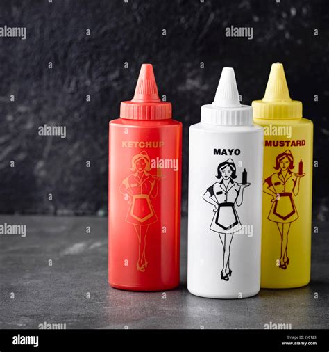 Squeeze bottles for ketchup, mayonnaise and mustard Stock Photo - Alamy