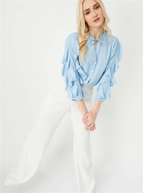 Buy Women Ruffled Tie-Up Neck Blouse with Camisole Online at just Rs ...