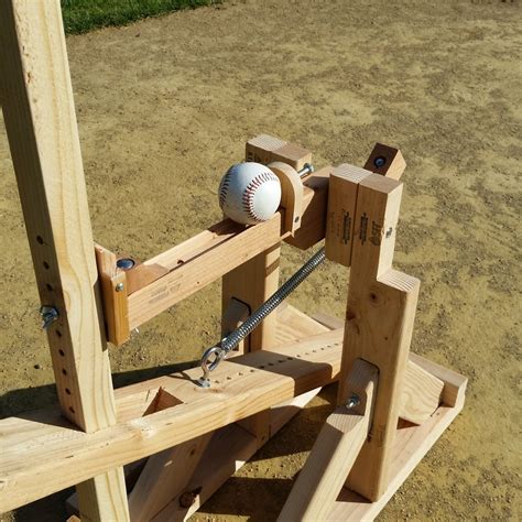 Image result for Antique Pitching Machine