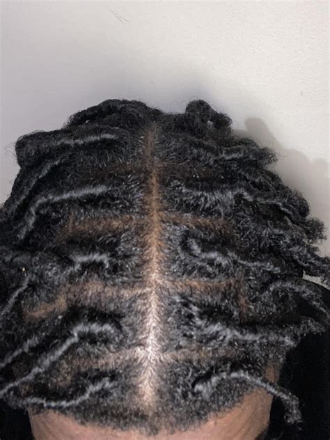 will my dreads still hang in my face if I have a middle part like this ...