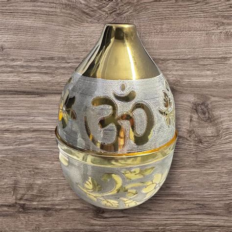 Silver Nariyal with Gold Polish & OM Satya Symbol