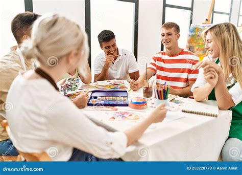 Group of People Smiling Happy Drawing Sitting on the Table at Art ...