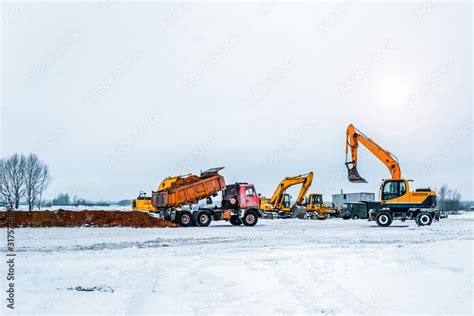 Image result for Large Excavators Loading Trucks