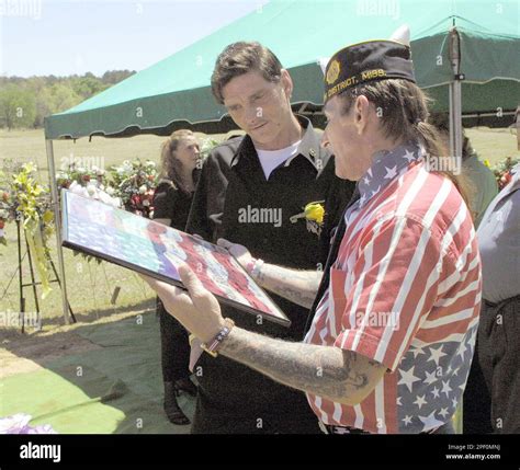 Louis A. Mabry Jr., left, father of U.S. Marine Pfc. Chris Mabry ...