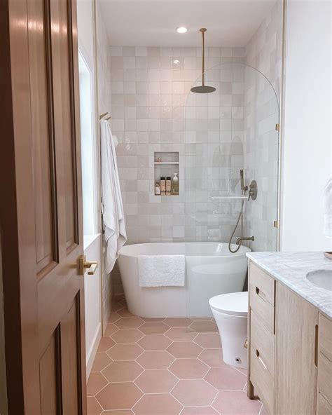 Bedrosians Tile on Instagram: "Soak in style with this sleek tub and ...