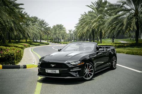 Rent Ford Mustang Black in Dubai - Convertible - Octane.Rent