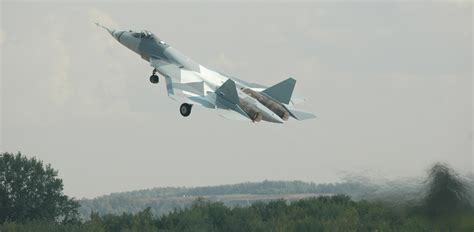 Russian T-50 PAK-FA fifth generation fighter flies alongside the MiG ...