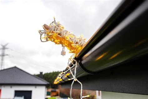 Installing Gutter Lights 的图像结果