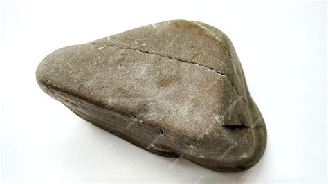 Premium Photo | Layered rocks, alternating between dark and light brown ...