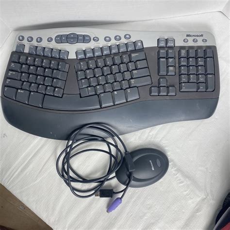 Image result for Microsoft Wireless Natural Multimedia Keyboard Receiver