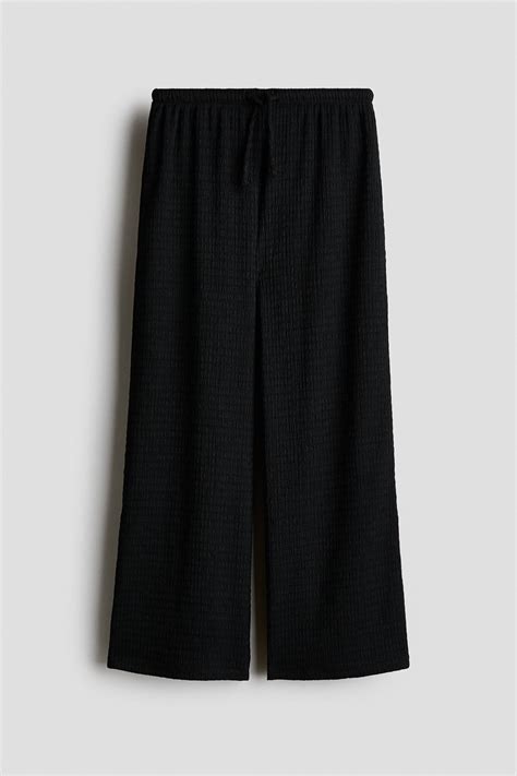Black Textured jersey trousers for kids | H&M IN