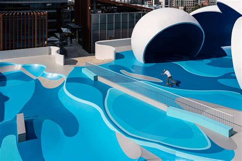 qingdao mixc rooftop skatepark's flowing curves echo ocean waves and sky