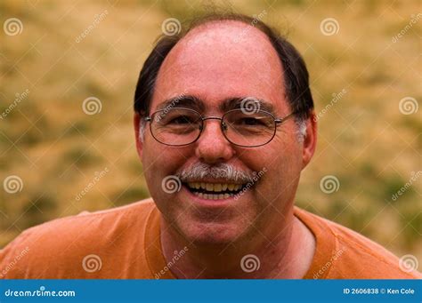 Middle age balding man stock photo. Image of spectacles - 2606838