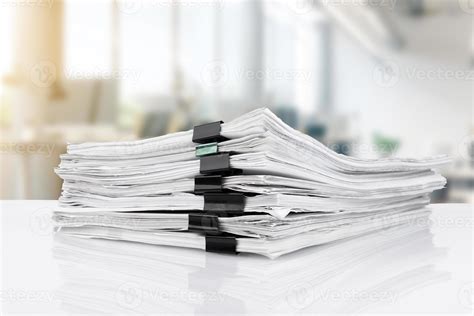 Stacks of papers on the desk in the office. business office 17644412 ...