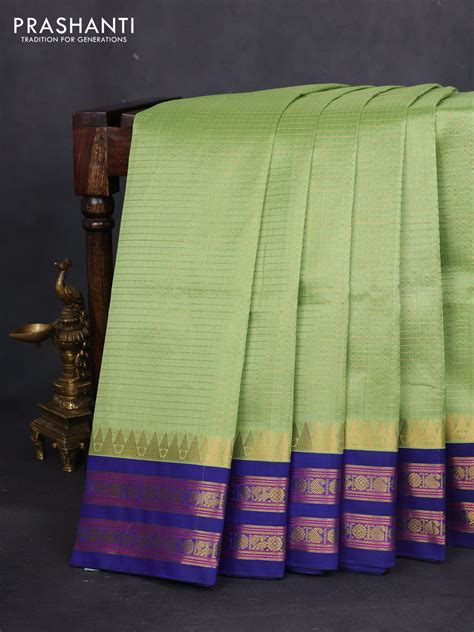 Silk cotton saree pista green and blue with allover small zari checked ...