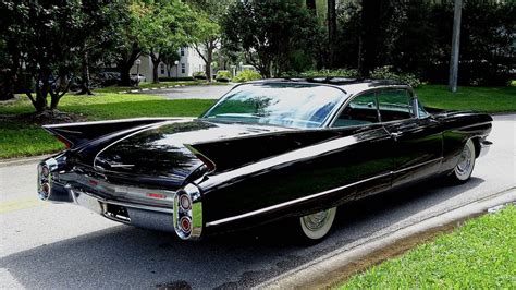 1960 Cadillac Coupe DeVille... Long, Shiny and Black : r/classiccars