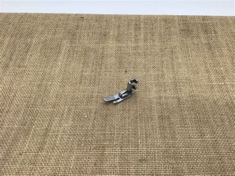 Image result for Lock Cutter Presser Foot Singer