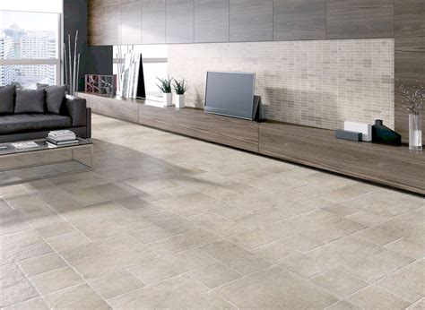 A collection of natural stone looking porcelain tiles which is ...