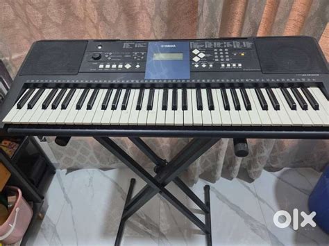 Yamaha PSR-E333 keyboard with a stand and a notes holder - Musical ...
