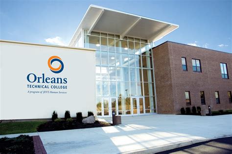 Orleans Technical College building exterior with large glass windows and logo, representing educational opportunities in managed IT services for Pennsylvania businesses.
