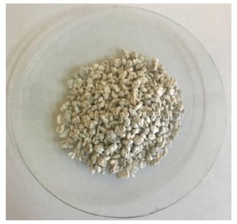 Lightweight Reactive Powder Concrete Containing Expanded Perlite