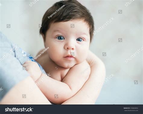 Baby Girl With Brown Hair And Blue Eyes Newborn