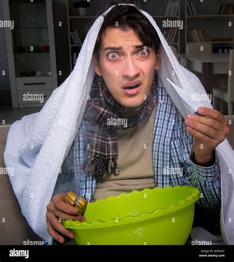 Sick man doing inhalation at night in home Stock Photo - Alamy