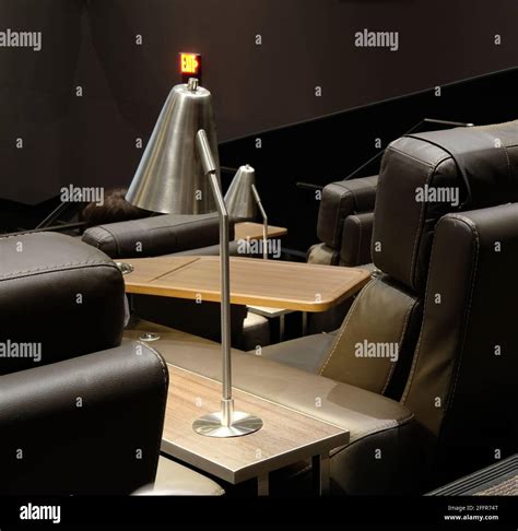 Leather seating, dining trays and decorative lamps at a Cinépolis ...
