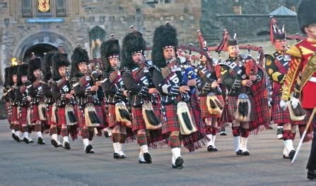 The Band of the Royal Marines and the Pipes, Drums and Highland Dancers ...