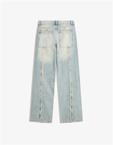 Low waist baggy jeans with fringing - Women | Bershka