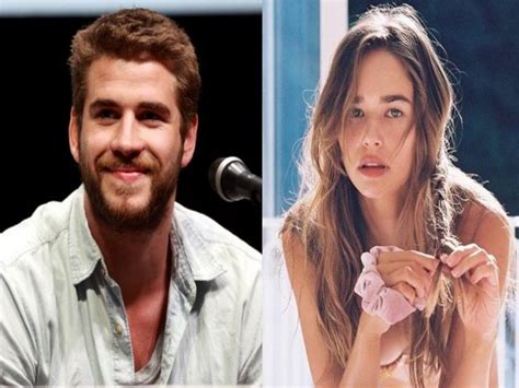 Liam Hemsworth hits the beach with girlfriend Gabriella Brooks